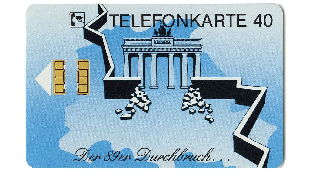 Diese Telefonkarte zur Erinnerung an den Mauerfall 1989 zeigt das Brandenburger Tor und die durchbrochene Mauer in Berlin. 